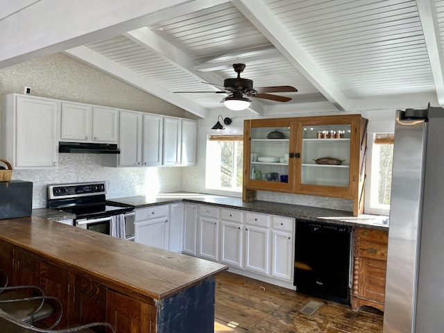 kitchen featuring dark countertops, appliances with stainless steel finishes, under cabinet range hood, and vaulted ceiling with beams