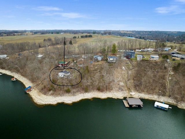 bird's eye view with a water view and a rural view