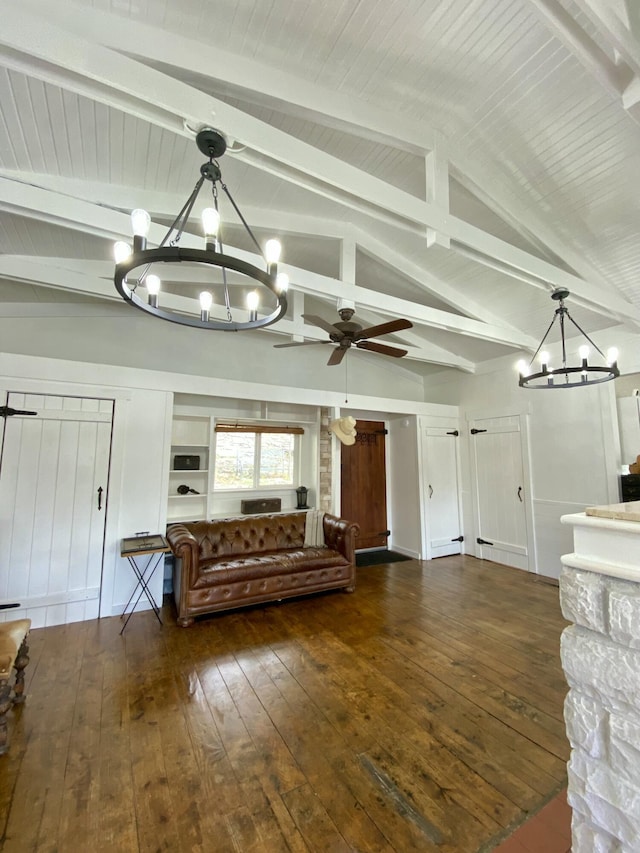 unfurnished living room with hardwood / wood-style floors, ceiling fan with notable chandelier, and vaulted ceiling with beams
