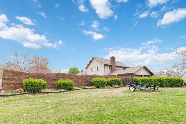 view of yard with fence