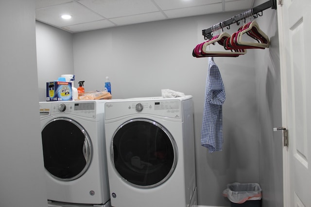 washroom with washing machine and clothes dryer, laundry area, and recessed lighting
