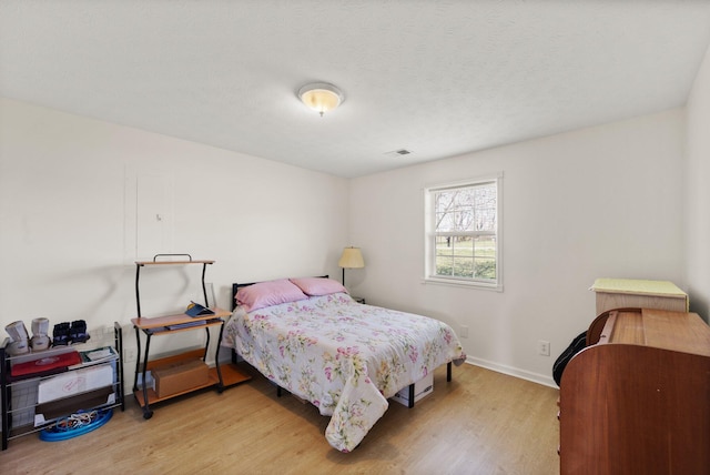 58 Mcclendon Ln, Russell Springs, KY 42642 - bedroom with light wood-style flooring and baseboards