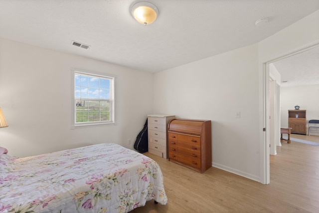 58 Mcclendon Ln, Russell Springs, KY 42642 - bedroom featuring light wood-style floors and baseboards