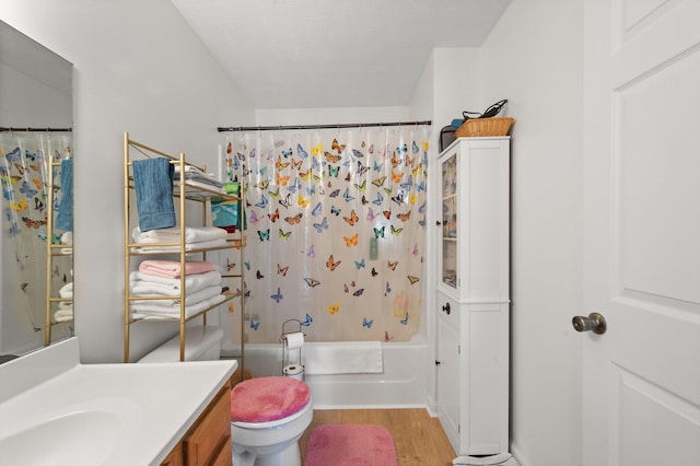 58 Mcclendon Ln, Russell Springs, KY 42642 - full bath with wood finished floors, vanity, shower / bath combination with curtain, and toilet