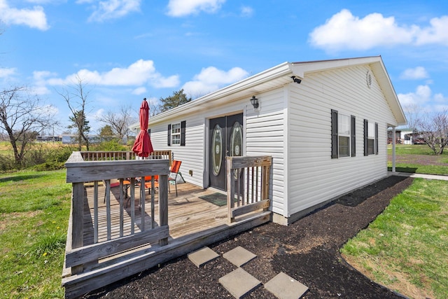 58 Mcclendon Ln, Russell Springs, KY 42642 - wooden deck with a yard and outdoor dining area