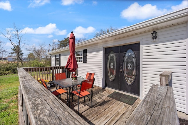 58 Mcclendon Ln, Russell Springs, KY 42642 - wooden deck featuring outdoor dining area