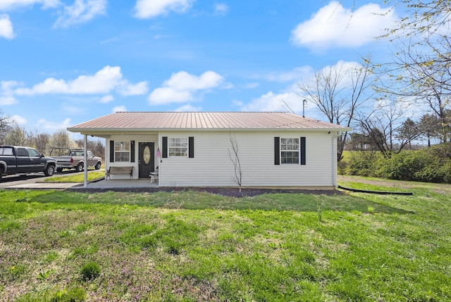 58 Mcclendon Ln, Russell Springs, KY 42642 - view of front of home with metal roof and a front yard