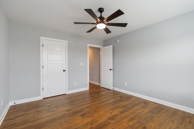 131 Patriot Trl, Berea, KY 40403 - unfurnished bedroom featuring baseboards, wood finished floors, and ceiling fan
