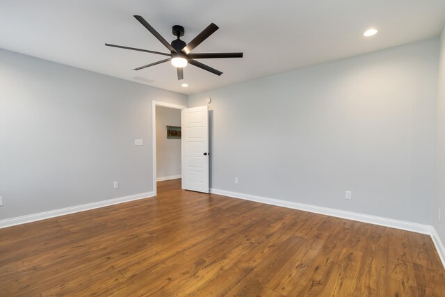 131 Patriot Trl, Berea, KY 40403 - bedroom featuring wood finished floors, a barn door, recessed lighting, and a ceiling fan
