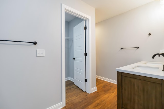 131 Patriot Trl, Berea, KY 40403 - bathroom with wood finished floors, double vanity, and baseboards