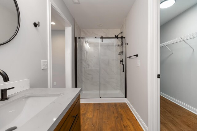 131 Patriot Trl, Berea, KY 40403 - full bathroom with a stall shower, wood finished floors, baseboards, and recessed lighting
