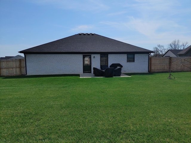 131 Patriot Trl, Berea, KY 40403 - rear view of house with a shingled roof and brick siding
