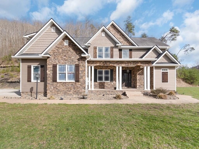 100 Mountain Enterprise Dr, Inez, KY 41224 - craftsman-style house with stone siding, a front lawn, and a porch