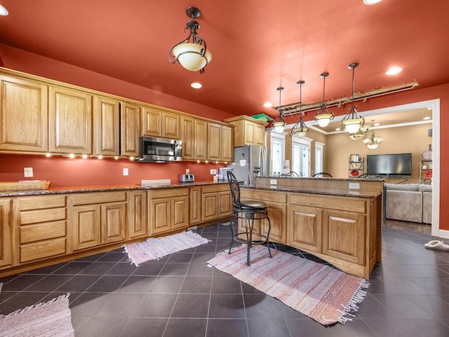 100 Mountain Enterprise Dr, Inez, KY 41224 - kitchen featuring dark tile patterned floors, a breakfast bar, recessed lighting, appliances with stainless steel finishes, and stone countertops