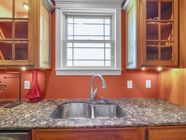 100 Mountain Enterprise Dr, Inez, KY 41224 - kitchen featuring glass insert cabinets, a sink, brown cabinetry, and dark stone countertops