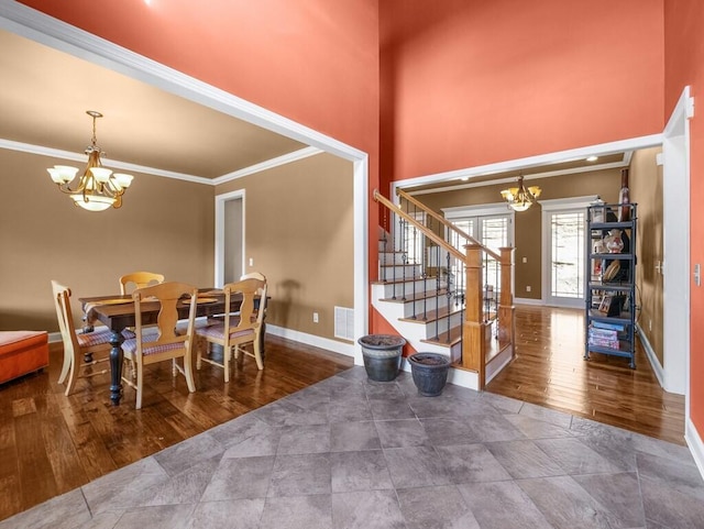 100 Mountain Enterprise Dr, Inez, KY 41224 - dining room with a notable chandelier, baseboards, stairway, and visible vents