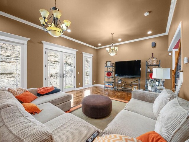 100 Mountain Enterprise Dr, Inez, KY 41224 - living room featuring baseboards, wood finished floors, a chandelier, and crown molding