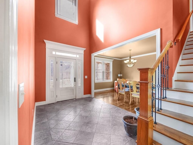 100 Mountain Enterprise Dr, Inez, KY 41224 - entryway with a high ceiling, a notable chandelier, baseboards, and stairway