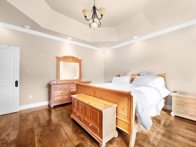 100 Mountain Enterprise Dr, Inez, KY 41224 - bedroom featuring crown molding, hardwood / wood-style flooring, baseboards, a raised ceiling, and a notable chandelier