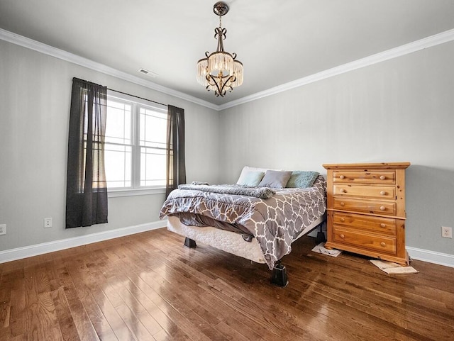 100 Mountain Enterprise Dr, Inez, KY 41224 - bedroom with hardwood / wood-style floors, ornamental molding, baseboards, and an inviting chandelier