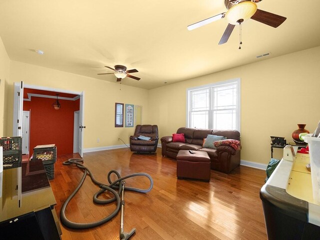 100 Mountain Enterprise Dr, Inez, KY 41224 - living area featuring baseboards, ceiling fan, visible vents, and wood finished floors