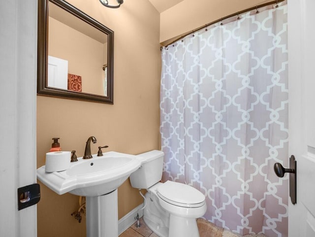 100 Mountain Enterprise Dr, Inez, KY 41224 - bathroom with toilet, tile patterned flooring, and a shower with curtain
