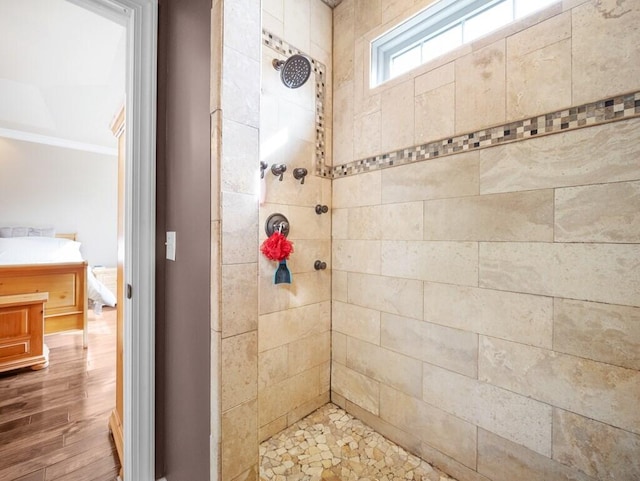 100 Mountain Enterprise Dr, Inez, KY 41224 - bathroom with ornamental molding, a tile shower, and wood finished floors