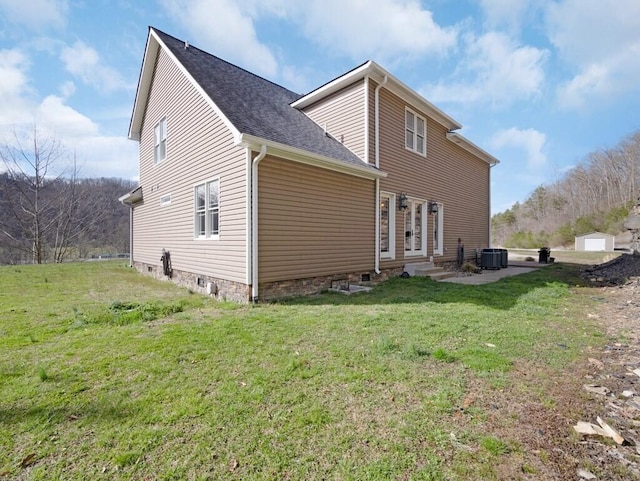 100 Mountain Enterprise Dr, Inez, KY 41224 - exterior space with entry steps, crawl space, roof with shingles, cooling unit, and a yard