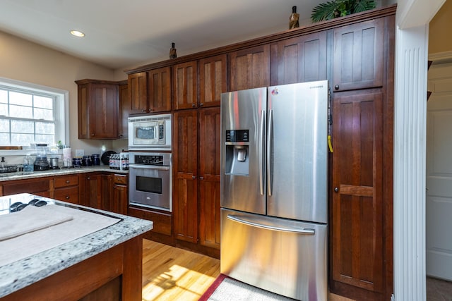 790 Thatchers Mill Rd, Paris, KY 40361 - kitchen featuring light stone countertops, light wood-style flooring, stainless steel appliances, and recessed lighting