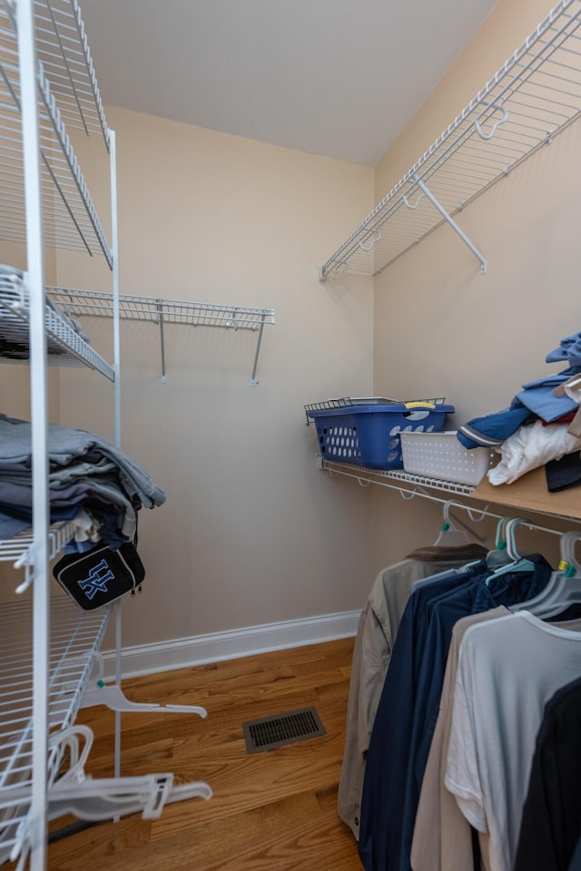 790 Thatchers Mill Rd, Paris, KY 40361 - walk in closet featuring visible vents and wood finished floors