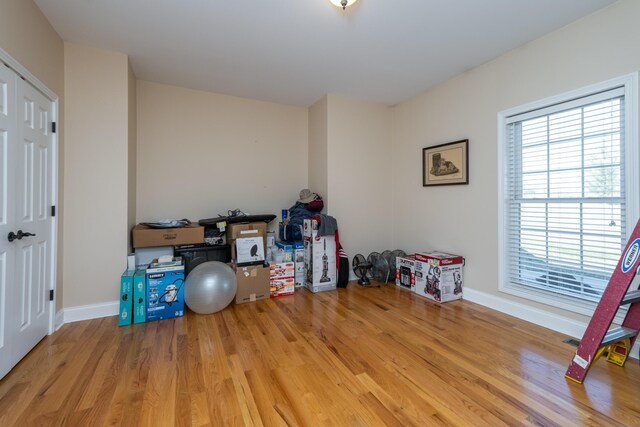 790 Thatchers Mill Rd, Paris, KY 40361 - game room with baseboards and wood finished floors