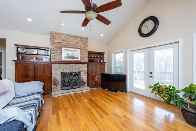 790 Thatchers Mill Rd, Paris, KY 40361 - living room with french doors, a ceiling fan, a fireplace, wood finished floors, and recessed lighting
