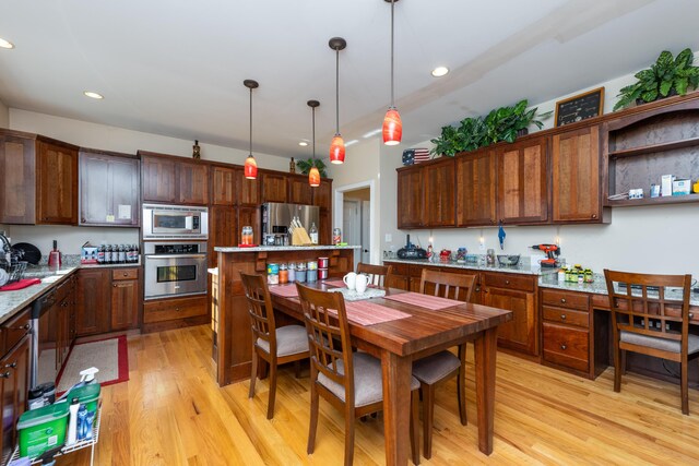 790 Thatchers Mill Rd, Paris, KY 40361 - kitchen with light countertops, light wood finished floors, stainless steel appliances, decorative light fixtures, and recessed lighting
