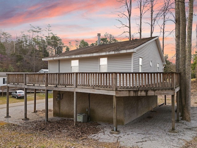 rear view of property with a deck