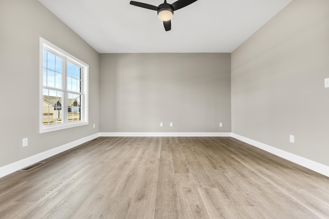 236 Candy Apple Ln, Richmond, KY 40475 - empty room featuring baseboards, a ceiling fan, wood finished floors, and visible vents