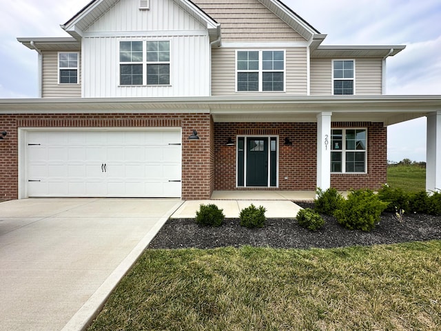 view of front of house featuring driveway, brick siding, board and batten siding, a garage, and a porch