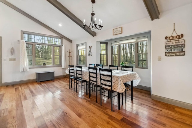 675 Indian Cave Subdivision Rd, Monticello, KY 42633 - dining room with beam ceiling, a chandelier, wood finished floors, plenty of natural light, and high vaulted ceiling