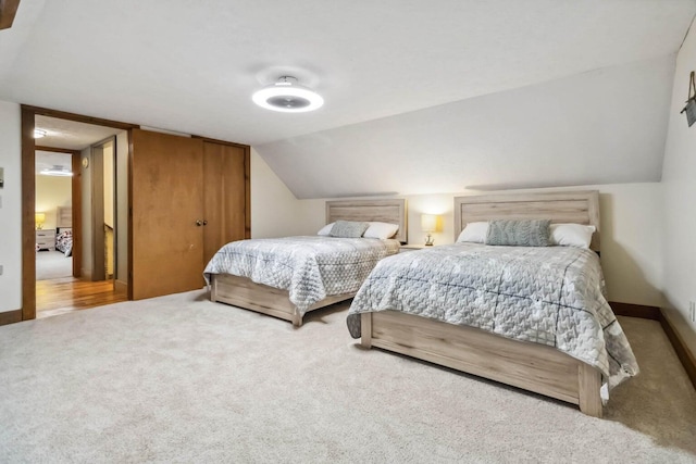 675 Indian Cave Subdivision Rd, Monticello, KY 42633 - carpeted bedroom with vaulted ceiling and baseboards