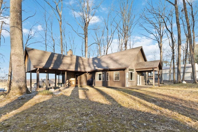 675 Indian Cave Subdivision Rd, Monticello, KY 42633 - back of house with a chimney and a shingled roof