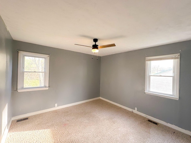 247 Mt Sterling Ave, Flemingsburg, KY 41041 - unfurnished room with a ceiling fan, baseboards, and visible vents