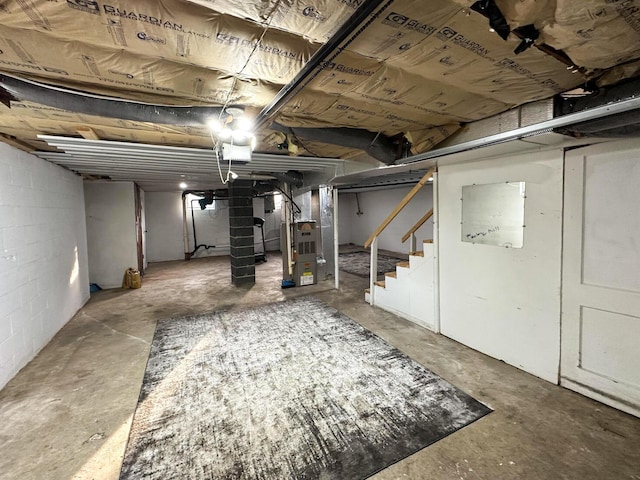 247 Mt Sterling Ave, Flemingsburg, KY 41041 - unfinished below grade area with heating unit and stairway