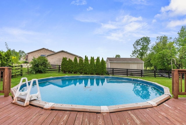 view of swimming pool with a deck