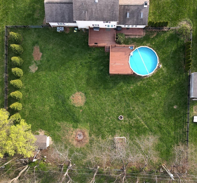 aerial view of property's location featuring a pool area