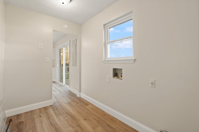 80 Westview Dr, Stanton, KY 40380 - hallway with light wood-style floors, baseboards, and a textured ceiling