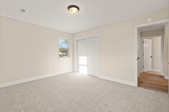 80 Westview Dr, Stanton, KY 40380 - unfurnished bedroom featuring a closet, baseboards, and carpet floors