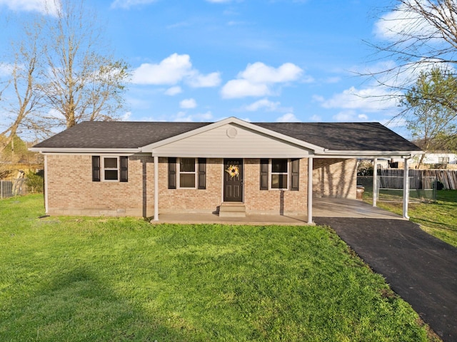 80 Westview Dr, Stanton, KY 40380 - ranch-style house with driveway, a front lawn, an attached carport, brick siding, and fence