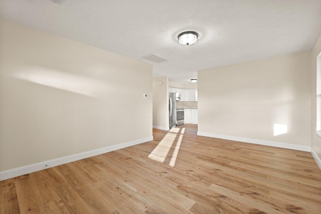 80 Westview Dr, Stanton, KY 40380 - unfurnished room featuring visible vents, light wood-type flooring, and baseboards