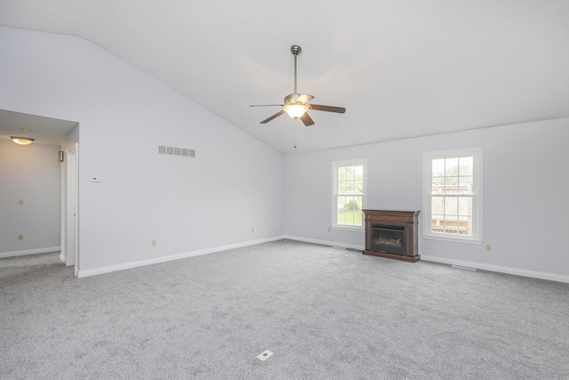 256 Sutton Ln, Lancaster, KY 40444 - unfurnished living room featuring ceiling fan, carpet, a fireplace, baseboards, and high vaulted ceiling