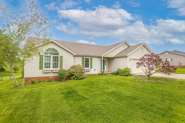 256 Sutton Ln, Lancaster, KY 40444 - ranch-style home with concrete driveway, a front lawn, a shingled roof, and an attached garage