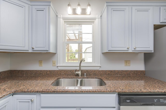 256 Sutton Ln, Lancaster, KY 40444 - kitchen with dishwasher, a sink, and dark stone counters